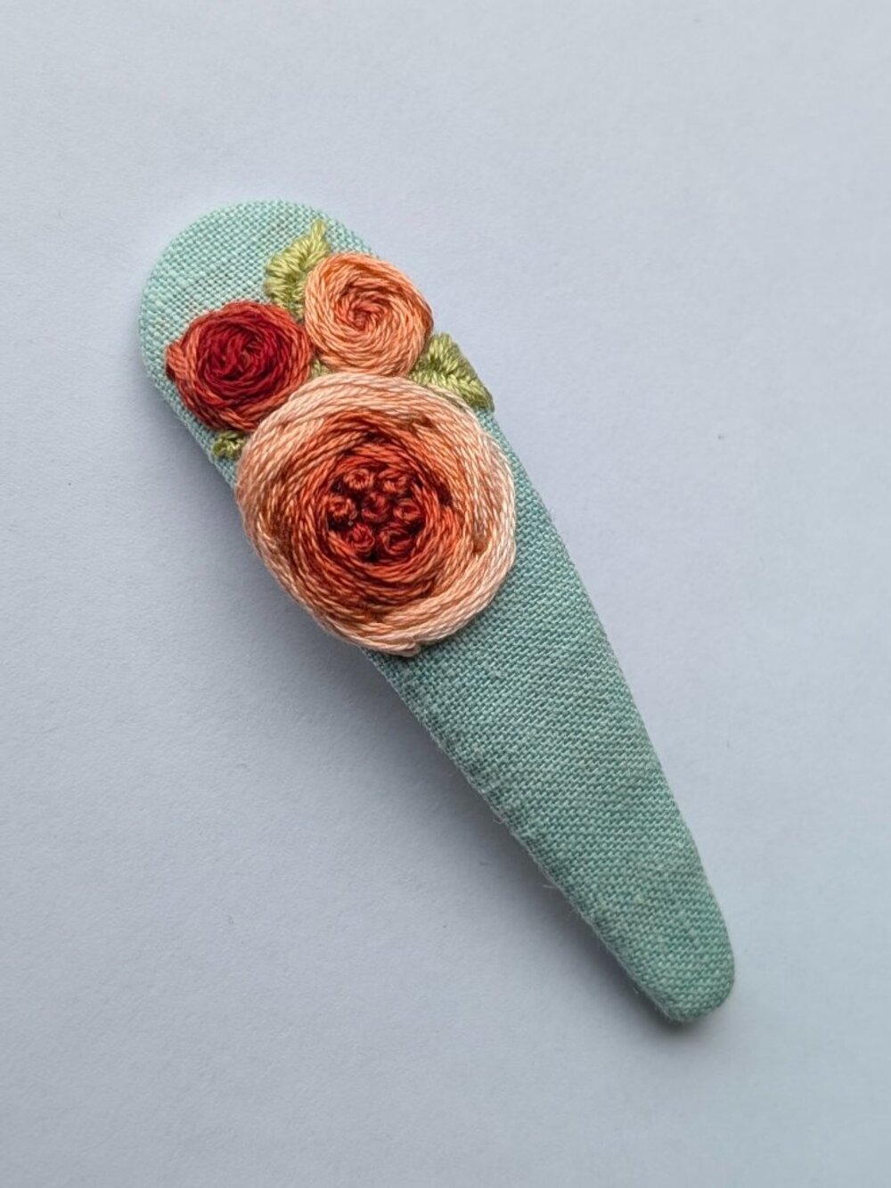 New Roses on Blue hand embroidered linen cotton large handmade hair clip